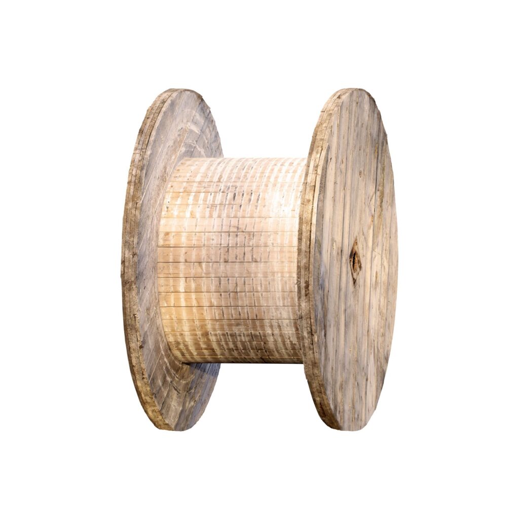 Empty cable reel isolated on white background. Wooden coil for electric wires
