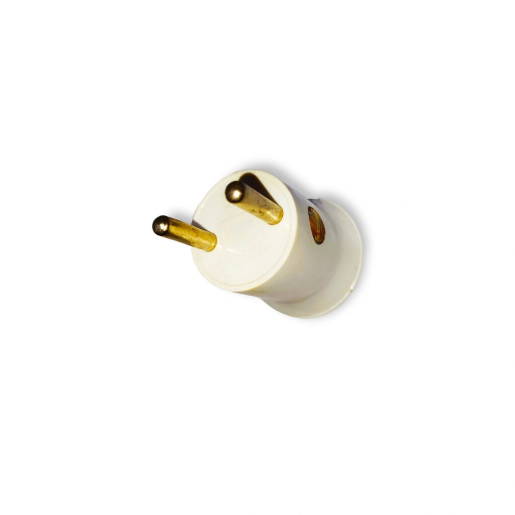 white broco plug and gold iron