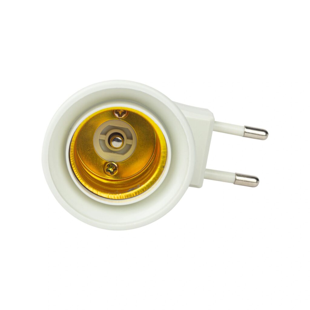 lamp adapter, plug with socket for a light bulb, isolated from the background
