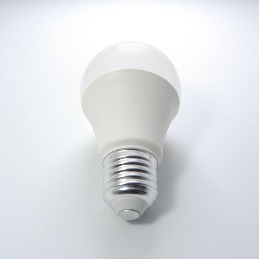 Power saving led bulb isolated on white background close-up view single object