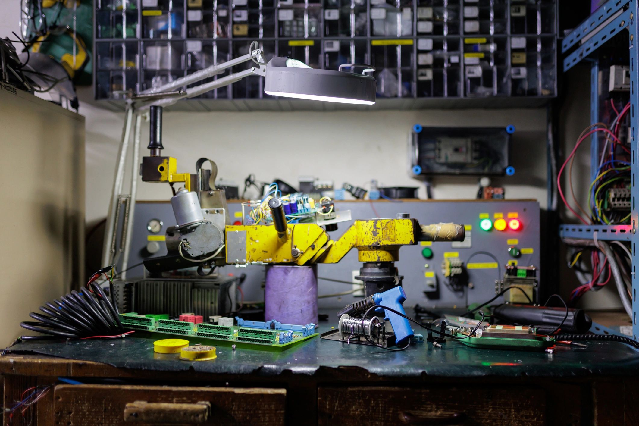 Technical workspace with electrical tools and components